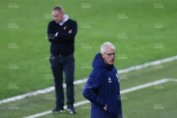 200321 Swansea City v Cardiff City, Sky Bet Championship - Cardiff City manager Mick McCarthy foreground with Swansea City head coach Steve Cooper in the background during the match