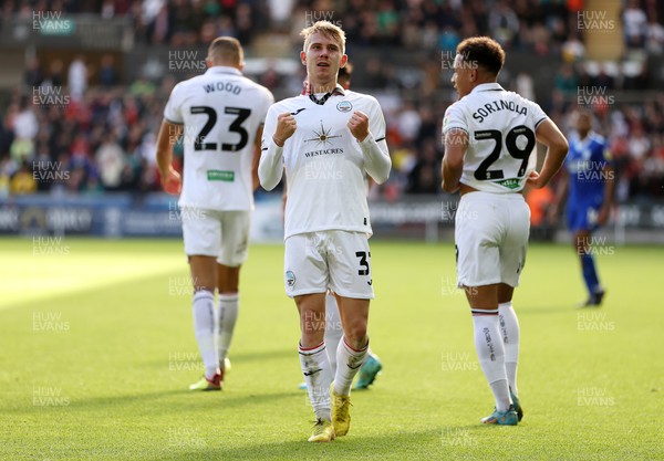 231022 - Swansea City v Cardiff City, South Wales Derby - SkyBet Championship - Ollie Cooper of Swansea City celebrates scoring a goal in the first half with team mates
