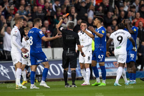 231022 - Swansea City v Cardiff City - Sky Bet Championship - Match Referee Darren Bond shows a red card to Callum Robinson of Cardiff City 
