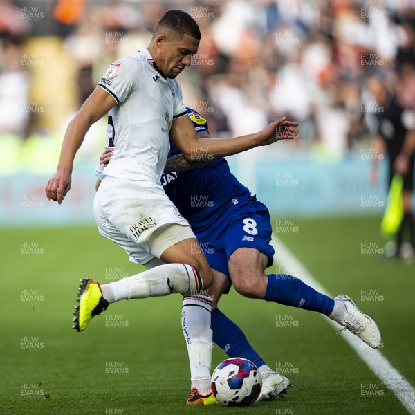 231022 - Swansea City v Cardiff City - Sky Bet Championship - Nathan Wood of Swansea City in action against Joe Ralls of Cardiff City