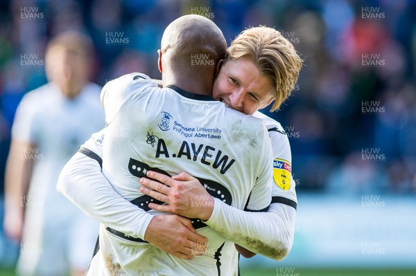 271019 - Swansea City v Cardiff City - SkyBet Championship - George Byers of Swansea City Celebrates with Andre Ayew after the final whistle 