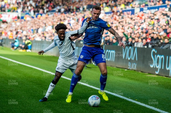 271019 - Swansea City v Cardiff City - SkyBet Championship - Nathan Dyer of Swansea City and Joe Ralls of Cardiff City battle for the ball 