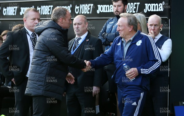 271019 - Swansea City v Cardiff City - SkyBet Championship - Swansea City Manager Steve Cooper and Cardiff City Manager Neil Warnock shake hands