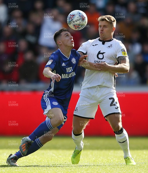 271019 - Swansea City v Cardiff City - SkyBet Championship - Gavin Whyte of Cardiff City is challenged by Jake Bidwell of Swansea City