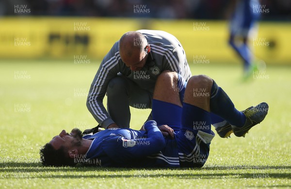 271019 - Swansea City v Cardiff City - SkyBet Championship - Sean Morrison of Cardiff City is seen to by medical staff