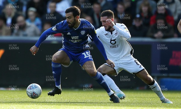 271019 - Swansea City v Cardiff City - SkyBet Championship - Marlon Pack of Cardiff City is challenged by Matt Grimes of Swansea City
