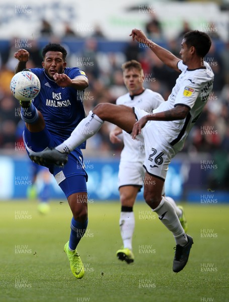271019 - Swansea City v Cardiff City - SkyBet Championship - Nathaniel Mendez-Laing of Cardiff City and Kyle Naughton of Swansea City go for the ball