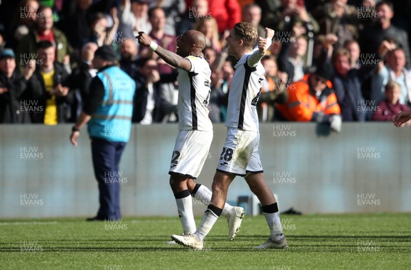 271019 - Swansea City v Cardiff City - SkyBet Championship - Andre Ayew and George Byers of Swansea City celebrate with the fans