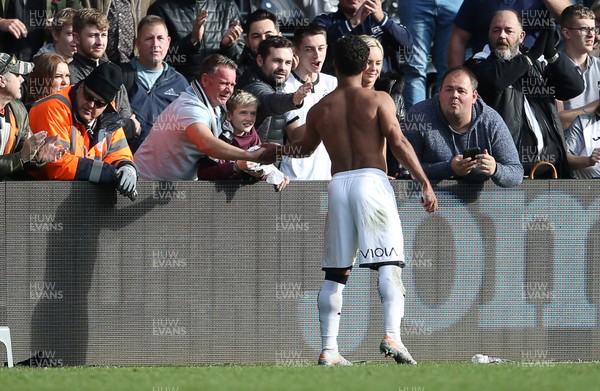 271019 - Swansea City v Cardiff City - SkyBet Championship - Wayne Routledge of Swansea City gives his jersey to a young fan