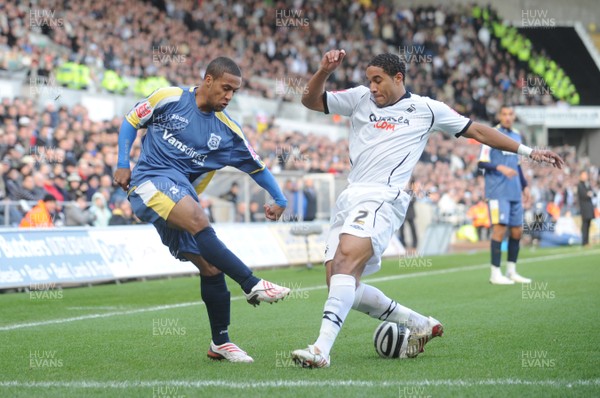 30.11.08 - Swansea City v Cardiff City - The Championship - Cardiff's Wayne Routledge is challenged by Swansea's Ashley Williams 