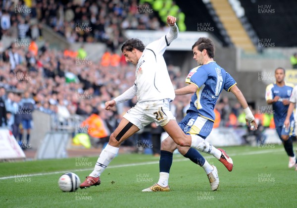 30.11.08 - Swansea City v Cardiff City - The Championship - Swansea's Fede Bessone is challenged by Cardiff's Joe Ledley 