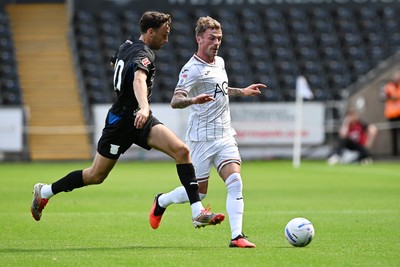 010826 - Swansea City v CD Leganes - Preseason Friendly - Josh Tymon of Swansea City is challenged by Zico Buurmeester of Leganes