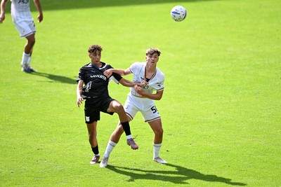 010826 - Swansea City v CD Leganes - Preseason Friendly - Carter Heywood of Swansea City challenges for the ball