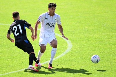 010826 - Swansea City v CD Leganes - Preseason Friendly - Marko Stamenic of Swansea City is challenged by Sebastian Figueredo of Leganes