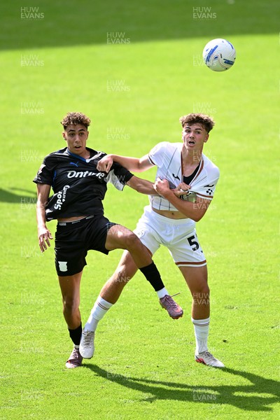 010826 - Swansea City v CD Leganes - Preseason Friendly - Carter Heywood of Swansea City challenges for the ball