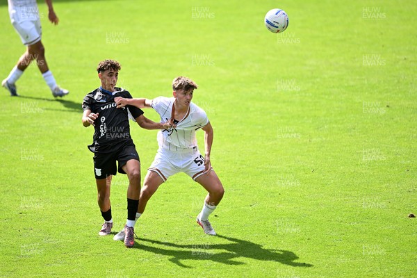 010826 - Swansea City v CD Leganes - Preseason Friendly - Carter Heywood of Swansea City challenges for the ball