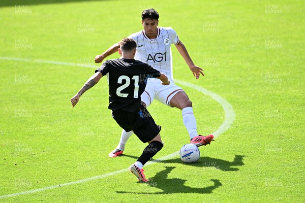 010826 - Swansea City v CD Leganes - Preseason Friendly - Marko Stamenic of Swansea City is challenged by Sebastian Figueredo of Leganes