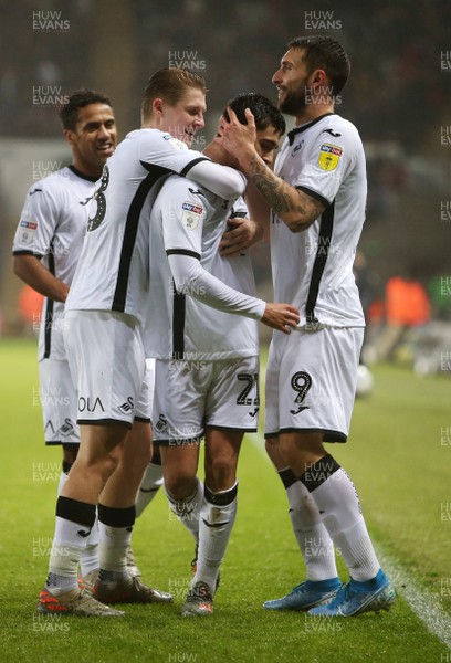 020120 - Swansea City v Charlton Athletic - SkyBet Championship - Yan Dhanda of Swansea City celebrates scoring a goal with team mates