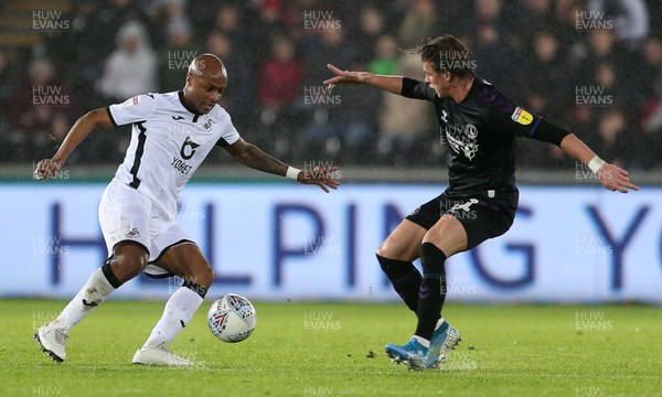 020120 - Swansea City v Charlton Athletic - SkyBet Championship - Andre Ayew of Swansea City is challenged by Conor Gallagher of Charlton Athletic
