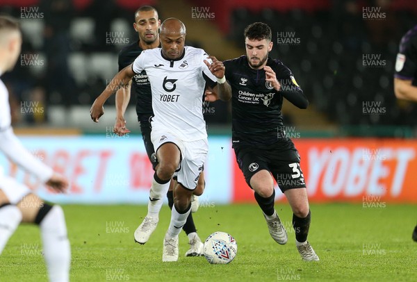 020120 - Swansea City v Charlton Athletic - SkyBet Championship - Andre Ayew of Swansea City is challenged by Ben Dempsey of Charlton Athletic