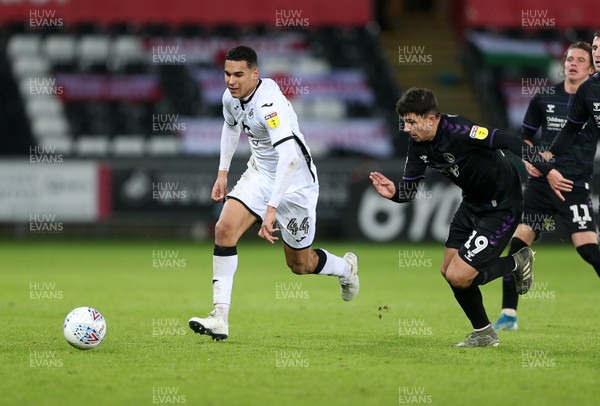 020120 - Swansea City v Charlton Athletic - SkyBet Championship - Ben Cabango of Swansea City is challenged by Albie Morgan of Charlton Athletic