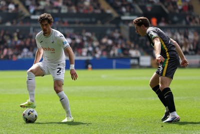 020526 - Swansea City v Charlton Athletic - Sky Bet Championship - Josh Key of Swansea City attacks with pressure from Conor Coventry of Charlton Athletic