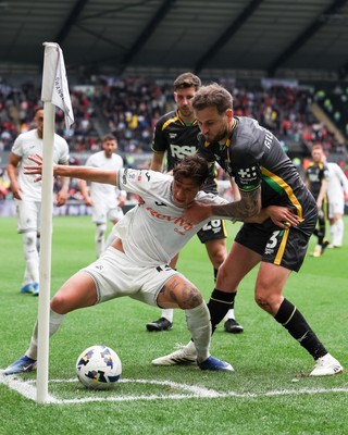 020526 - Swansea City v Charlton Athletic - Sky Bet Championship - Goncalo Franco of Swansea City defends the ball in the corner against Macaulay Gillesphey of Charlton Athletic
