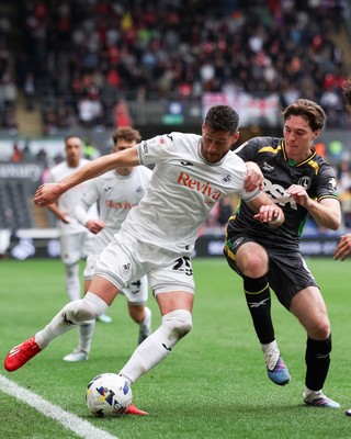 020526 - Swansea City v Charlton Athletic - Sky Bet Championship - Joel Ward of Swansea City defends the ball against Conor Coventry of Charlton Athletic