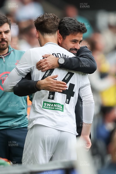 020526 - Swansea City v Charlton Athletic - Sky Bet Championship - Vitor Matos Manager of Swansea City hugs Thomas Woodward of Swansea City as he makes his debut