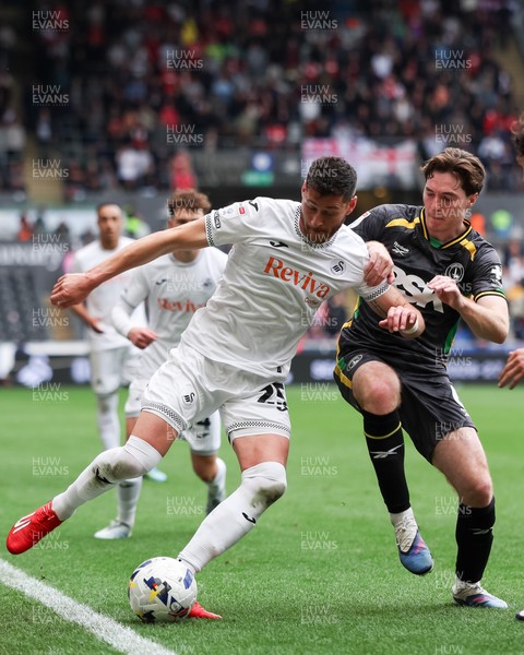 020526 - Swansea City v Charlton Athletic - Sky Bet Championship - Joel Ward of Swansea City defends the ball against Conor Coventry of Charlton Athletic