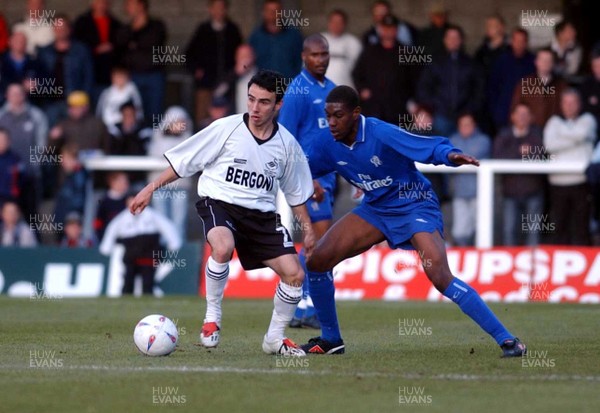 060503 - Swansea City v Chelsea - Roger Freestone Testimonial - Swansea's Leon Britton holds off a challenge from Craig Rocastle