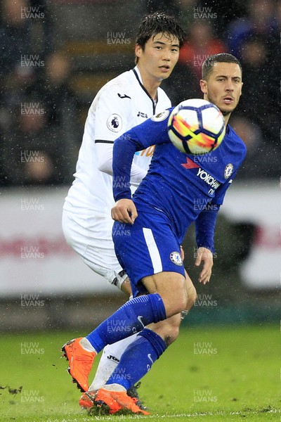 280418 - Swansea City v Chelsea, Premier League - Eden Hazard of Chelsea (right) in action with Ki Sung-Yueng of Swansea City