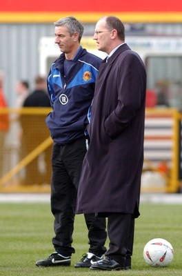 290105 - Swansea City v Chester City - League Two - Chester's Ian Rush and Mark Aizelwood watch their side warm up before the match