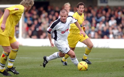 290105 - Swansea City v Chester City - League Two - Swansea's Andy Robinson pushes ahead