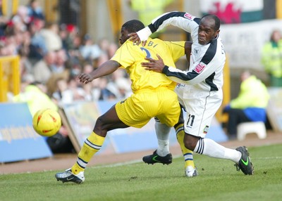 290105 - Swansea City v Chester City - League Two - Swansea's Adrian Forbes tangles with George Elokobi