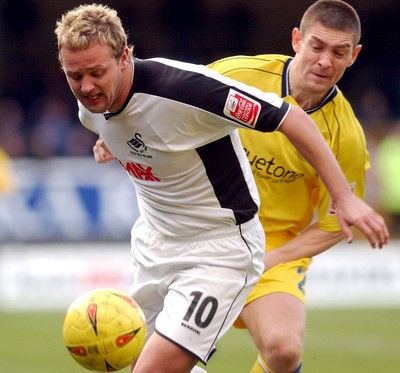 290105 - Swansea City v Chester City - League Two - Swansea's Lee Trundle beats David Bayliss