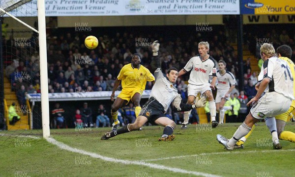 290105 - Swansea City v Chester City - League Two - Swansea's Lee Trundle fires shot pat keeper Chris Mackenzie, but fails to find the net