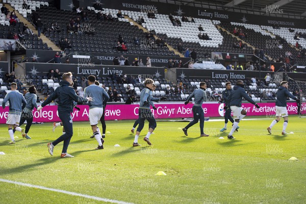 050322 - Swansea City v Coventry City - Sky Bet Championship - Swansea City players during the pre-match warm-up 