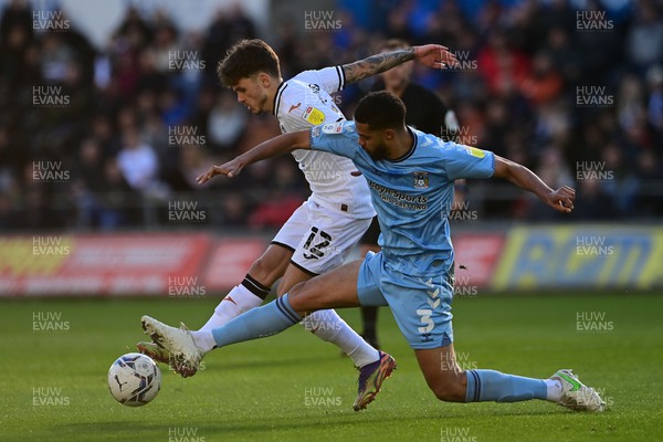 050322 - Swansea City v Coventry City - Sky Bet Championship - Jamie Paterson of Swansea City vies for possession with Jake Clarke-Salter of Coventry City 