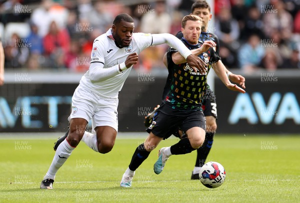 070423 - Swansea City v Coventry City - SkyBet Championship - Olivier Ntcham of Swansea City is challenged by Josh Eccles of Coventry