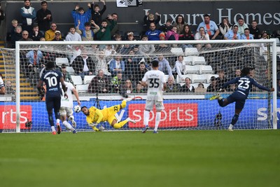 210326 - Swansea City v Coventry City - Sky Bet Championship - Brandon Thomas-Asante of Coventry scores from the penalty spot