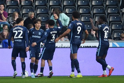 210326 - Swansea City v Coventry City - Sky Bet Championship - Tatsuhiro Sakamoto of Coventry celebrates scoring a goal with team mates