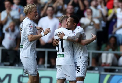 120825 - Swansea City v Crawley Town, Carabao Cup - Ronald of Swansea City celebrates scoring a goal with team mates