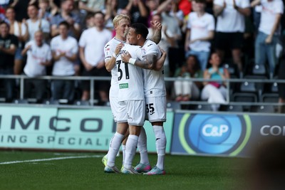 120825 - Swansea City v Crawley Town, Carabao Cup - Ronald of Swansea City celebrates scoring a goal with team mates
