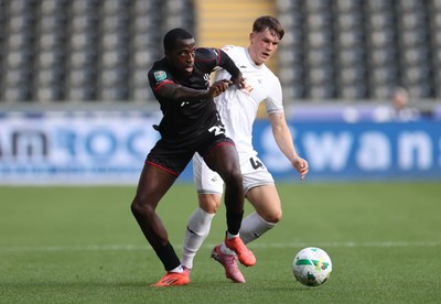 120825 - Swansea City v Crawley Town, Carabao Cup - Ade Adeyemo of Crawley Town is tackled by Sam Parker of Swansea City 