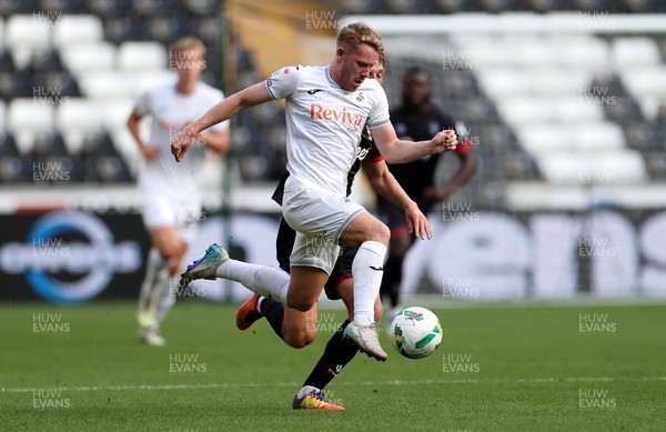 120825 - Swansea City v Crawley Town, Carabao Cup - Ollie Cooper of Swansea City makes a break