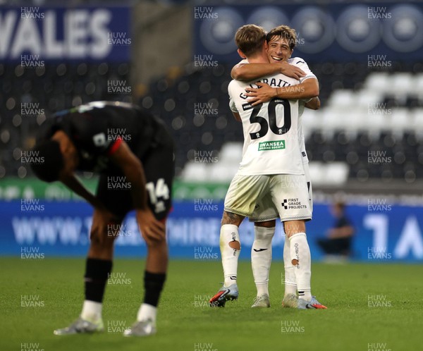 120825 - Swansea City v Crawley Town, Carabao Cup - Ethan Galbraith of Swansea City celebrates scoring a goal with Goncalo Franco