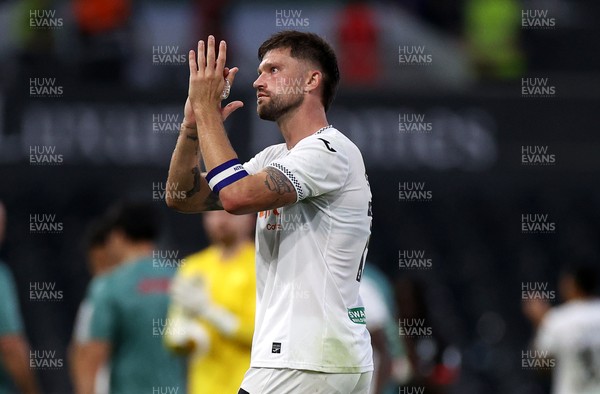120825 - Swansea City v Crawley Town, Carabao Cup - Cameron Burgess of Swansea City thanks the fans at full time