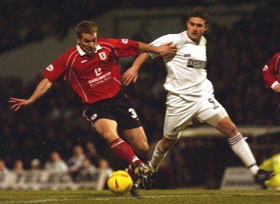 040203 - Swansea City v Darlington - Third Division - Darlington's Stuart Whitehead gets the ball from James Thomas