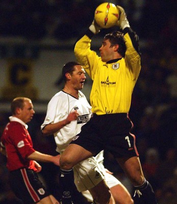 040203 - Swansea City v Darlington - Third Division - Darlington's keeper, Andrew Collet saves a Swansea free kick